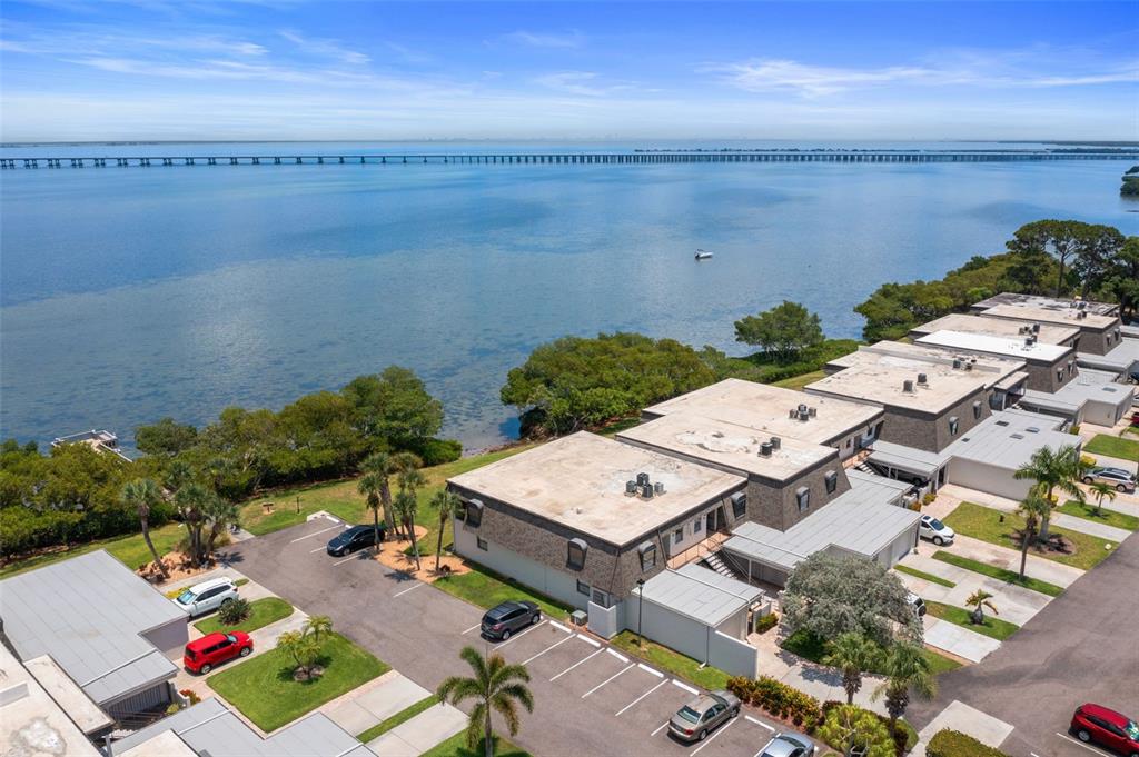 an aerial view of a house with ocean view
