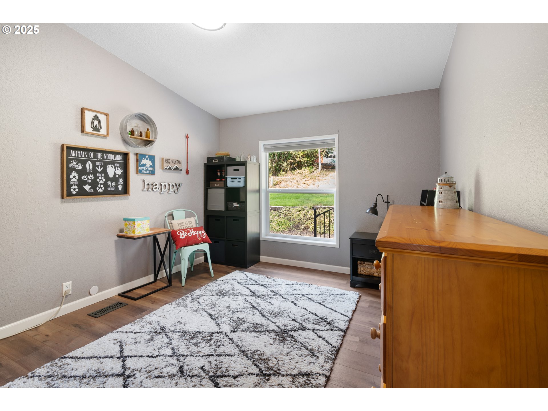 30402 Townsend Road Lebanon, OR 97355 - Photo 14 of 46 a bed room with a bed and a television