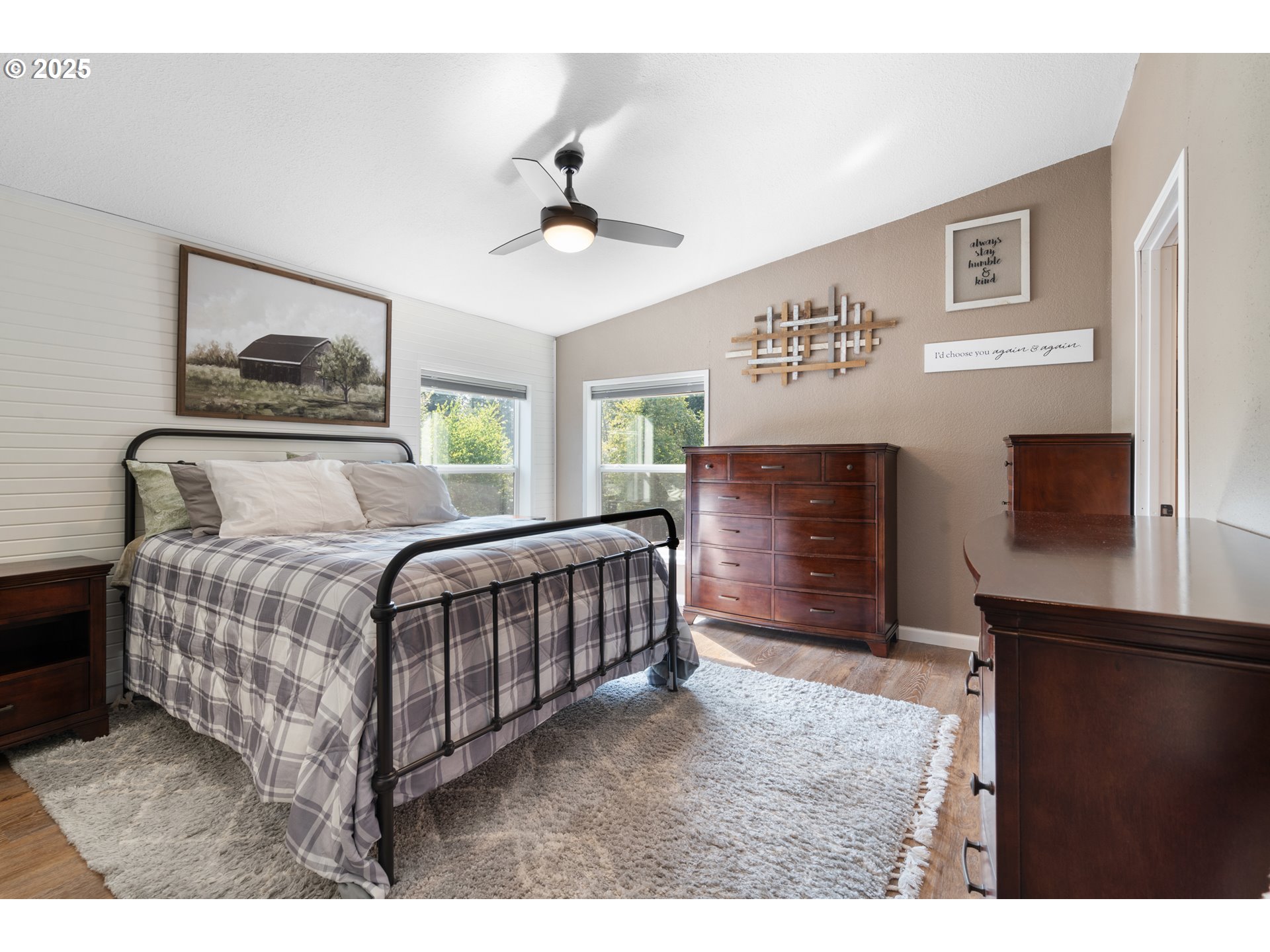 30402 Townsend Road Lebanon, OR 97355 - Photo 16 of 46 a bedroom with a bed window and a flat screen tv