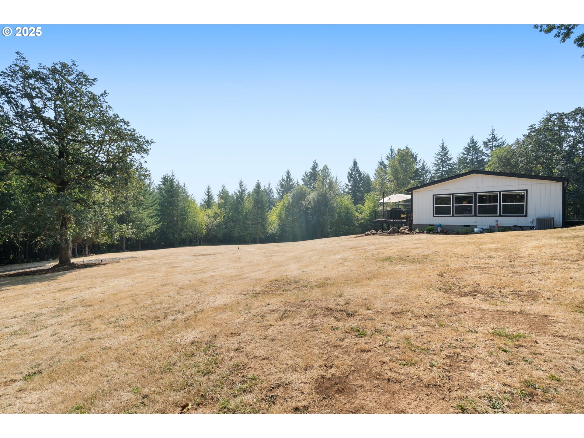 30402 Townsend Road Lebanon, OR 97355 - Photo 28 of 46 a view of ocean with trees in the background