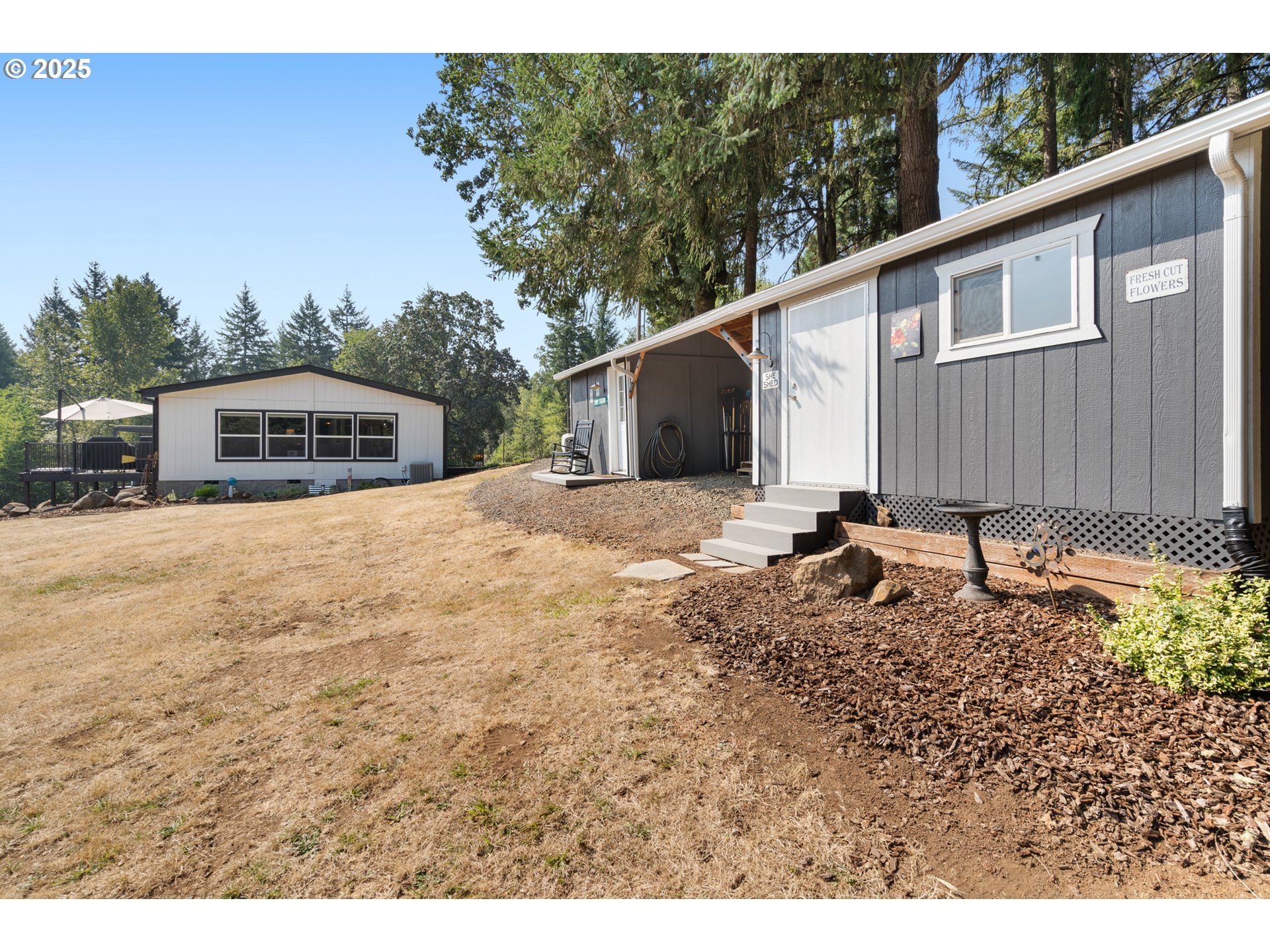 30402 Townsend Road Lebanon, OR 97355 - Photo 37 of 46 a view of a house with a yard