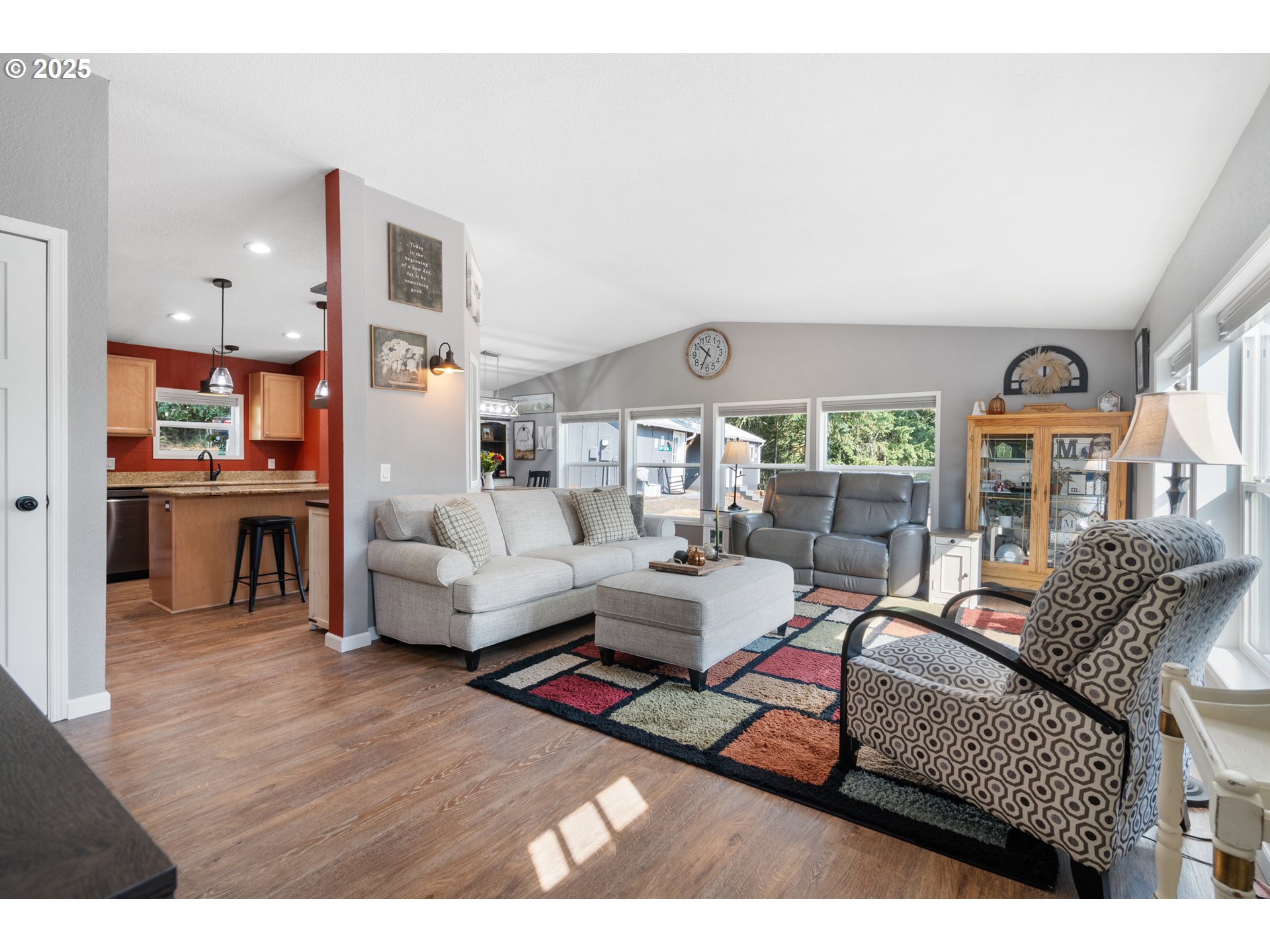 30402 Townsend Road Lebanon, OR 97355 - Photo 4 of 46 a living room with furniture and a fireplace