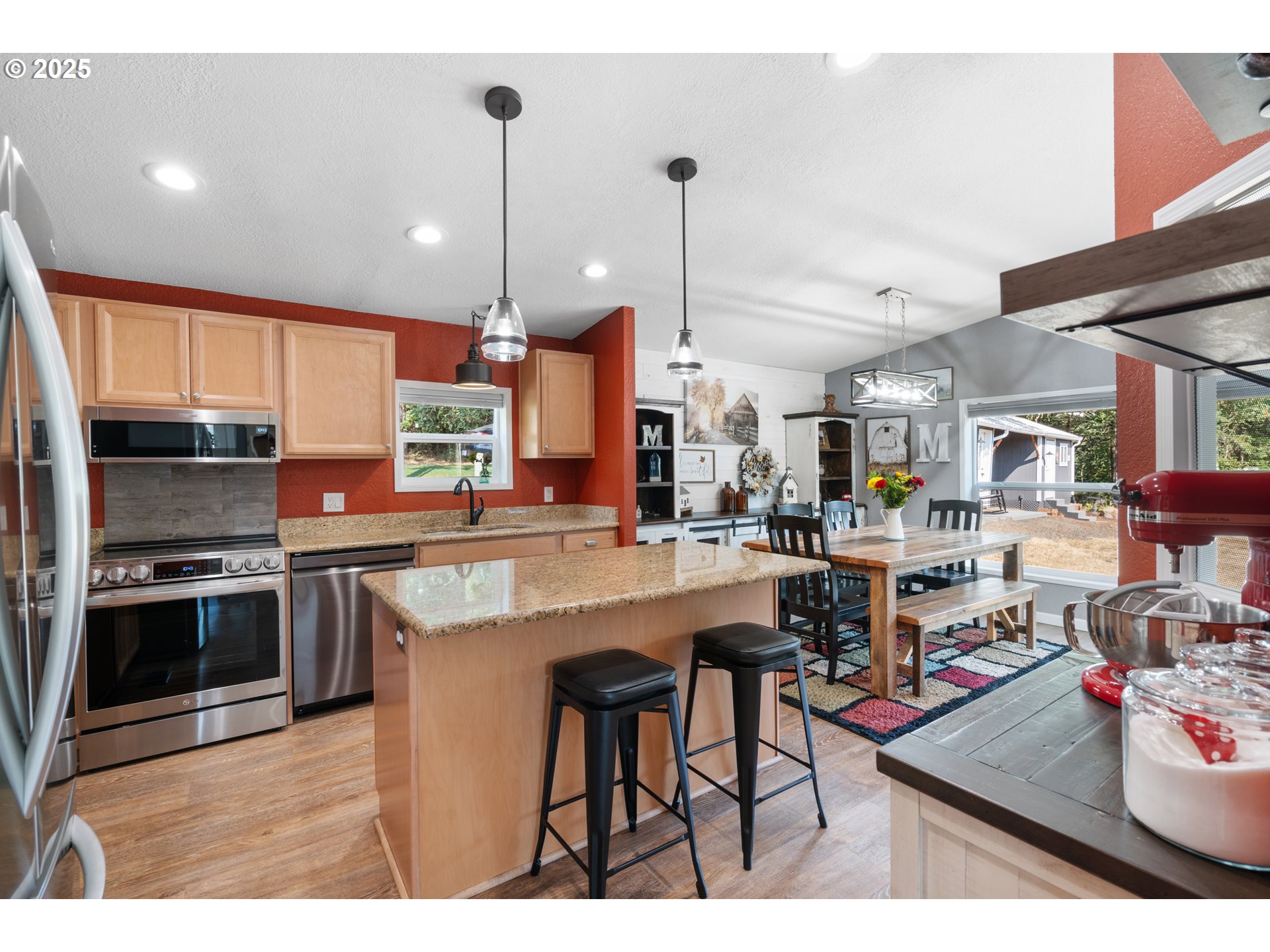 30402 Townsend Road Lebanon, OR 97355 - Photo 7 of 46 a kitchen with stainless steel appliances granite countertop sink stove top oven and cabinets