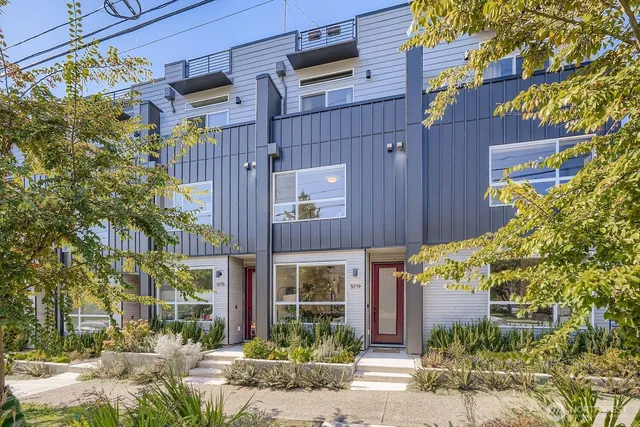 a front view of a building with street view