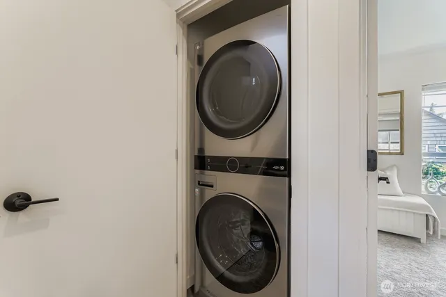 a view of a washer and dryer in a utility room
