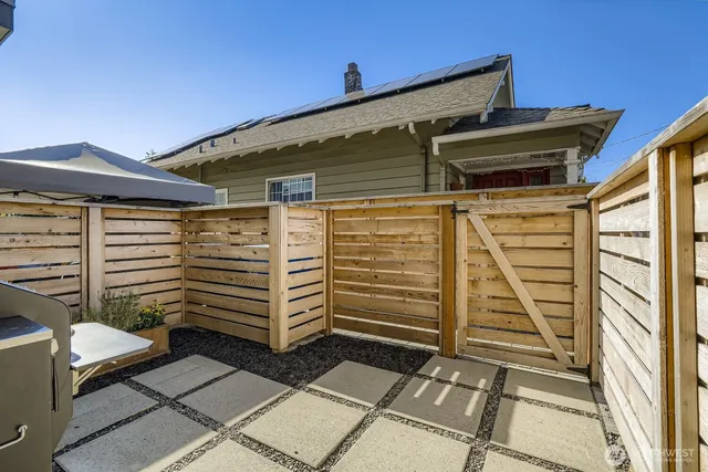 a view of a house with a door and stairs