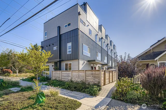 a view of a building with a yard