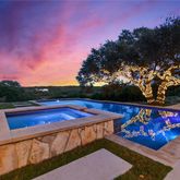 a view of a balcony with chairs