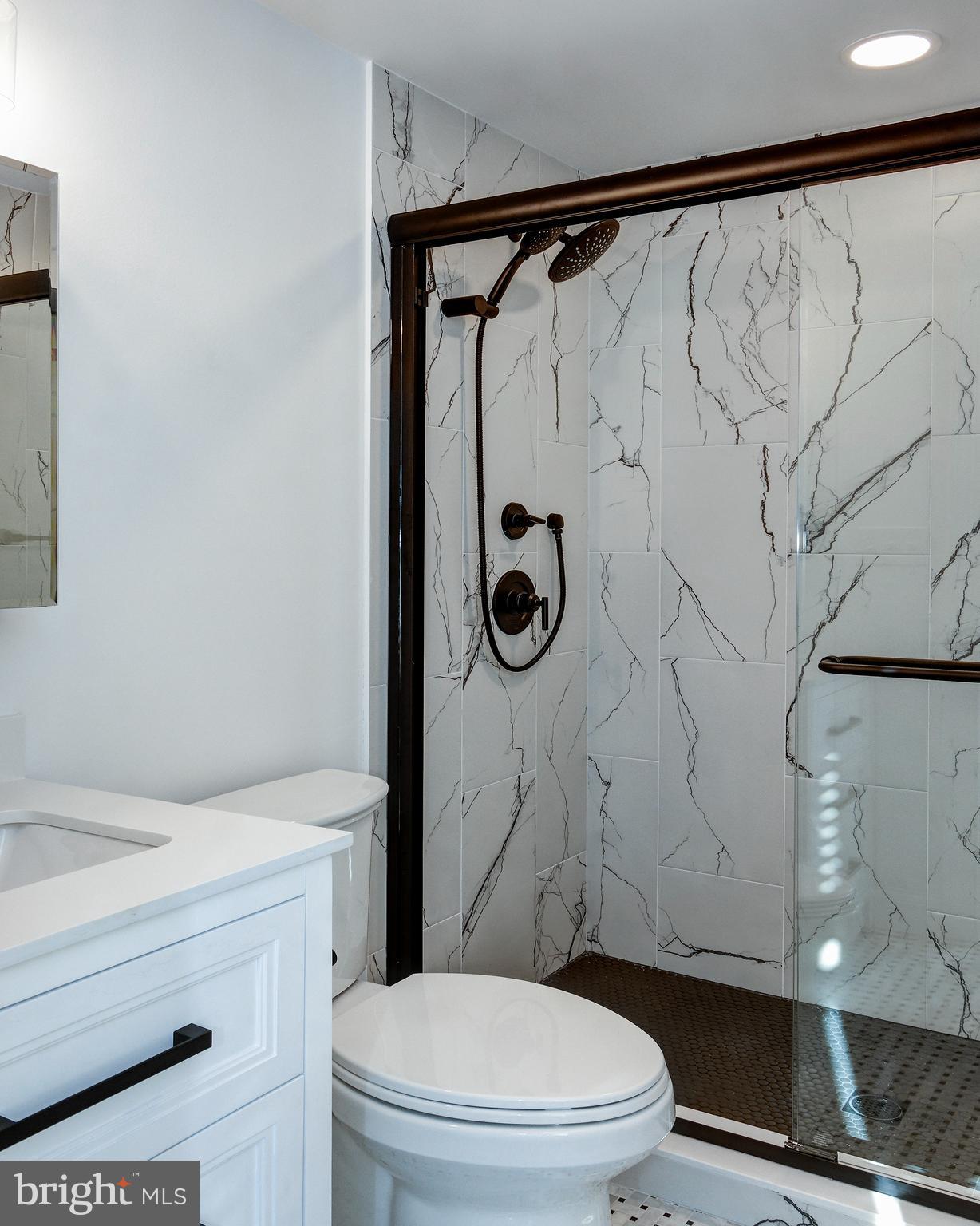 13 Wilkins Avenue Haddonfield, NJ 08033 - Photo 16 of 20 a bathroom with a toilet and a shower