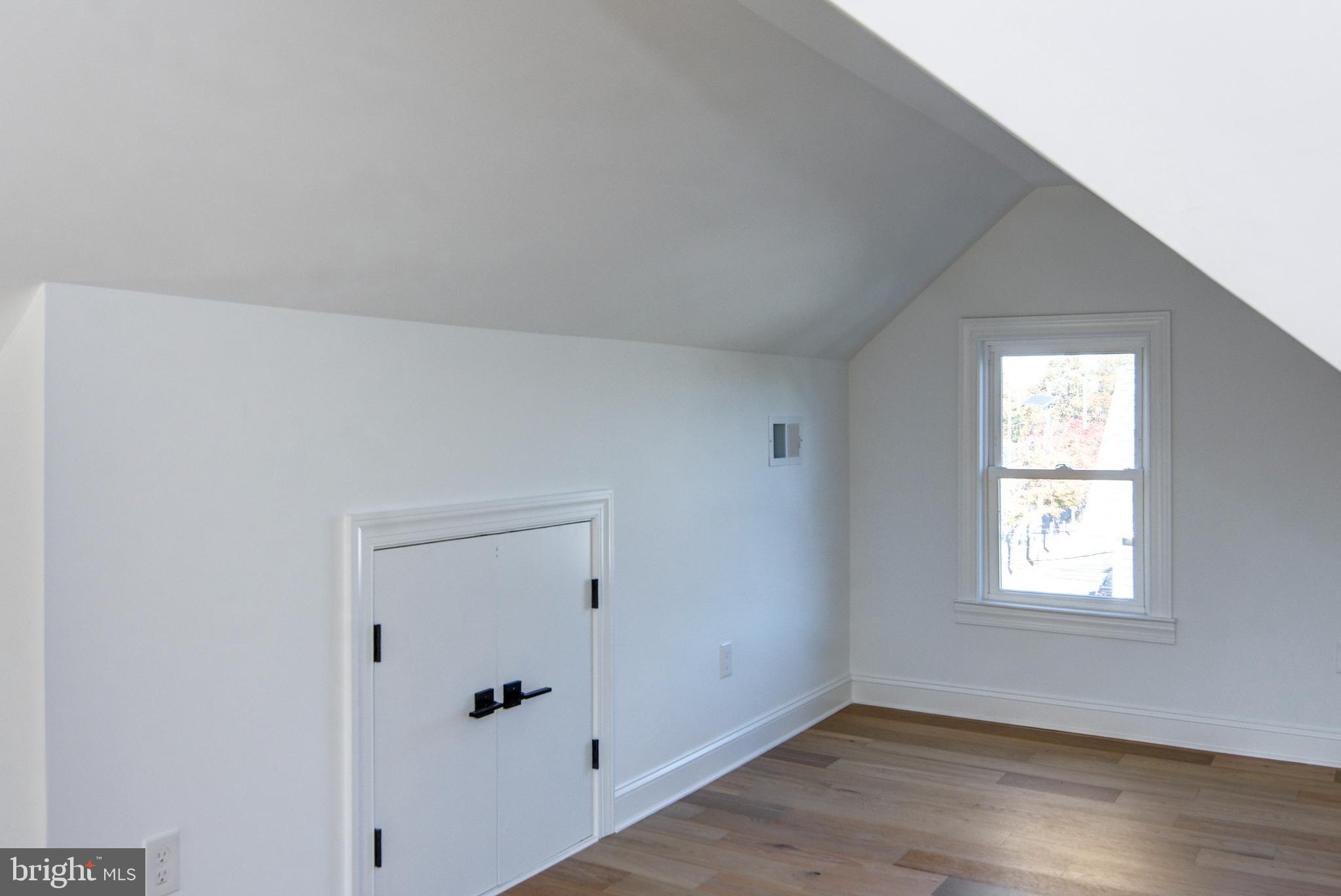 13 Wilkins Avenue Haddonfield, NJ 08033 - Photo 20 of 20 an empty room with wooden floor and window
