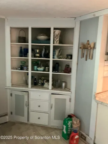 a bathroom with a toilet and a sink