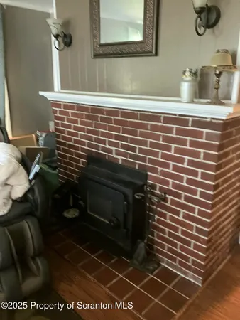 a stove top oven sitting inside of a kitchen
