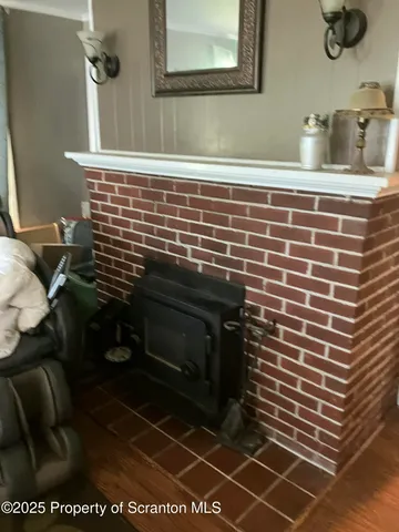 a stove top oven sitting inside of a kitchen