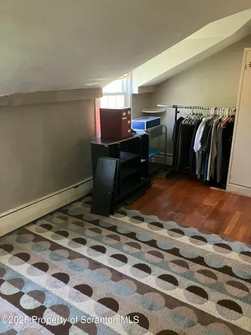 a view of a bench in a garden