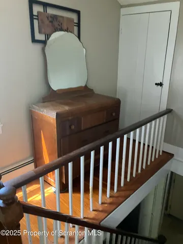 a backyard of a house with a garden and deck