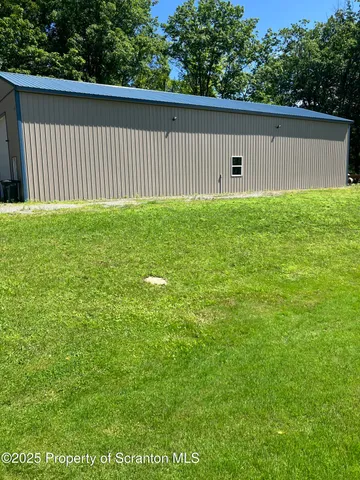 a view of a backyard with a garden