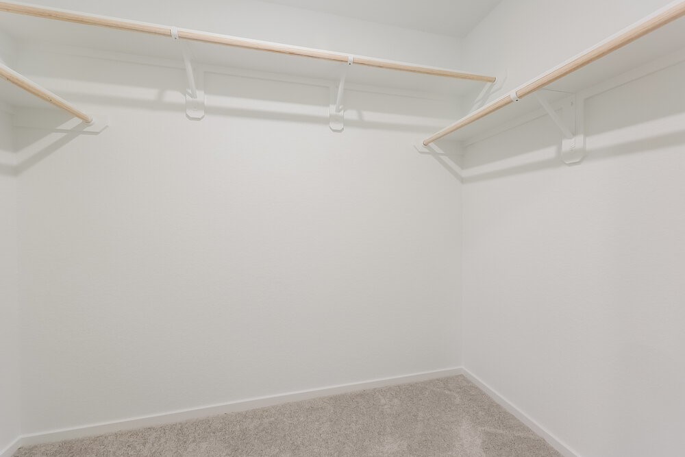 1527 Sunset Ridge Drive Conroe, TX 77306 - Photo 12 of 16 a view of an empty walk in closet