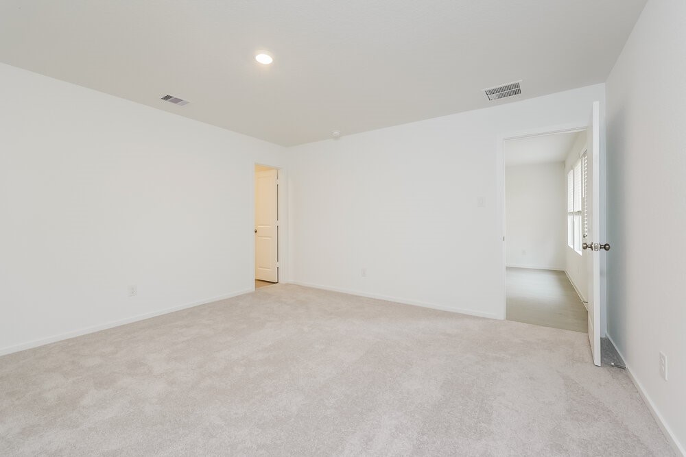 1527 Sunset Ridge Drive Conroe, TX 77306 - Photo 8 of 16 a view of an empty room