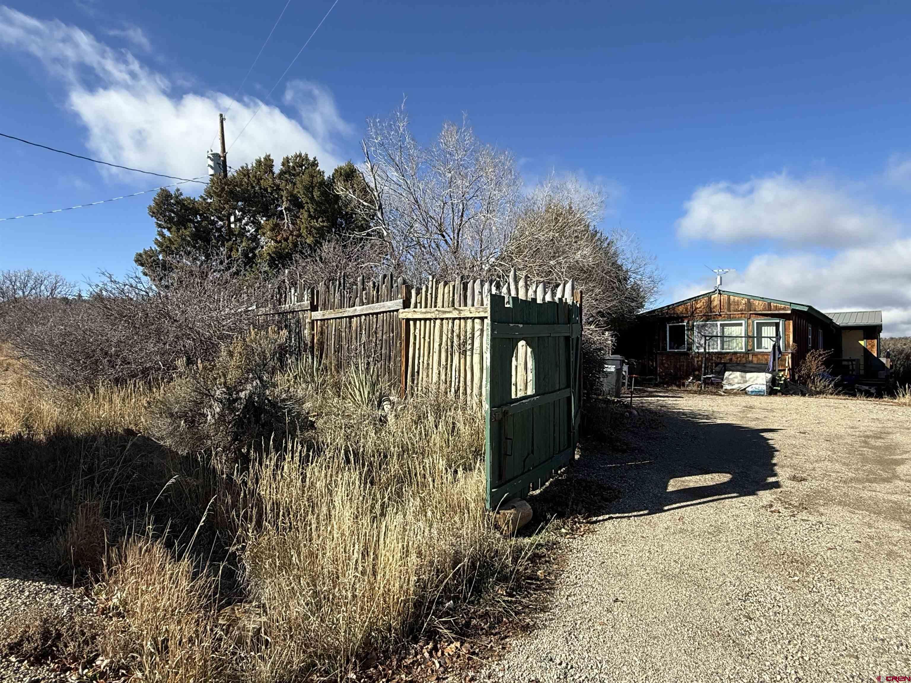 35575 Rd H.5 Mancos, CO 81328 - Photo 12 of 12 a view of a house with a yard