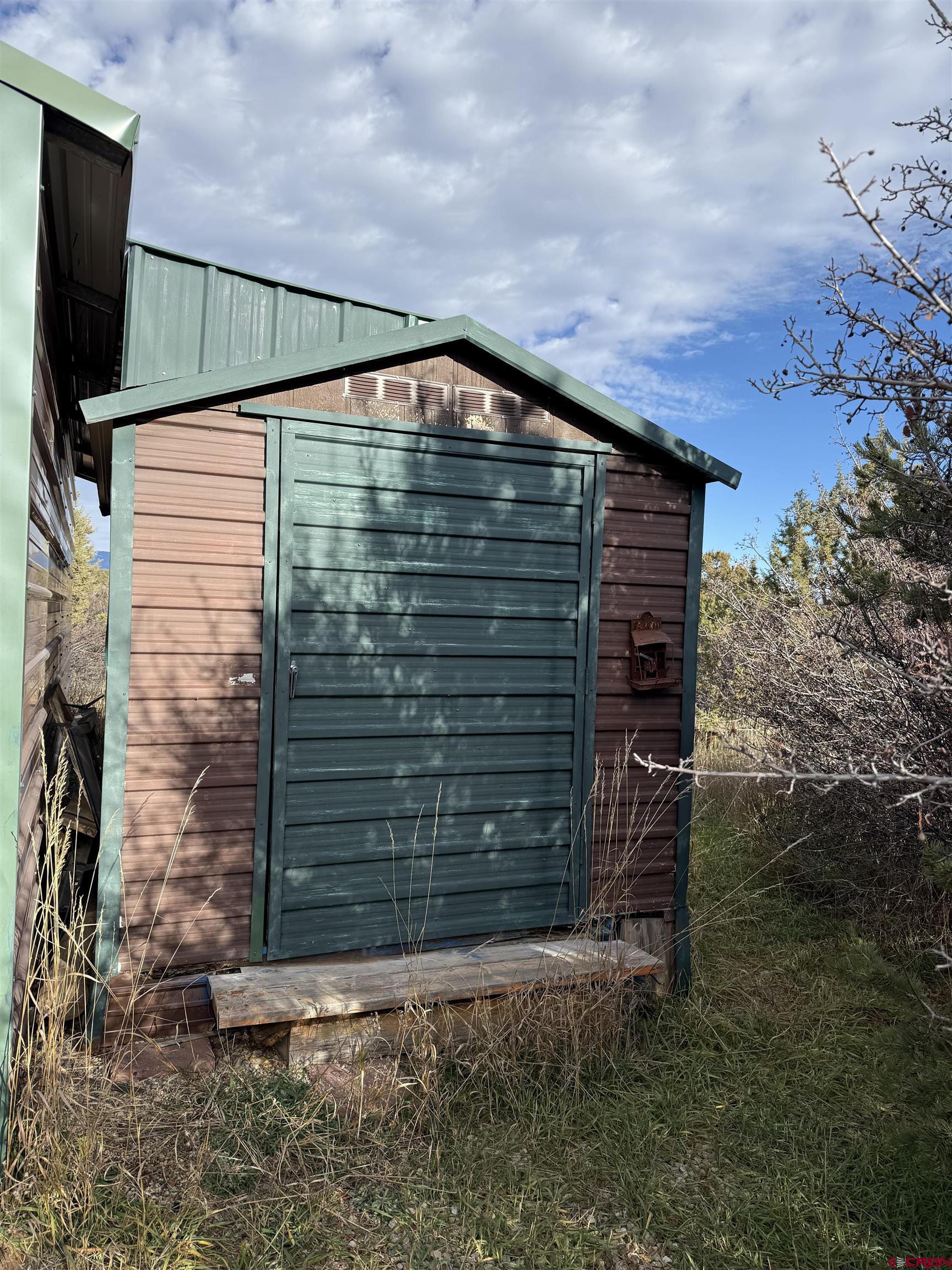 35575 Rd H.5 Mancos, CO 81328 - Photo 9 of 12 a backyard of a house