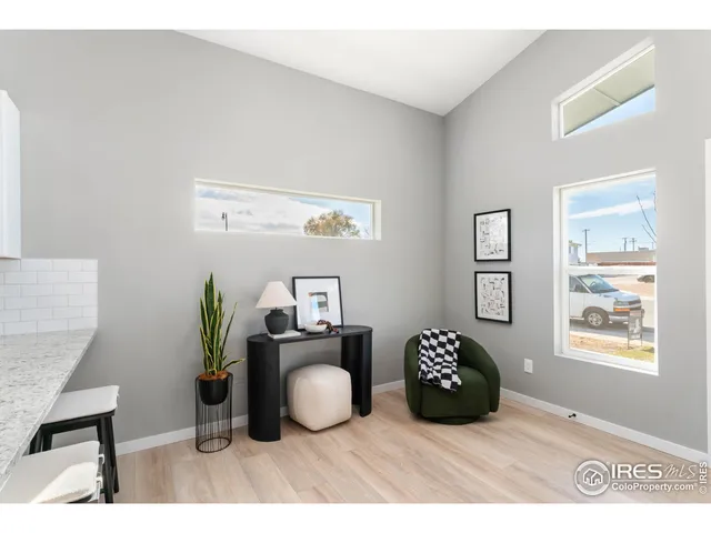 a bedroom with a bed and a table