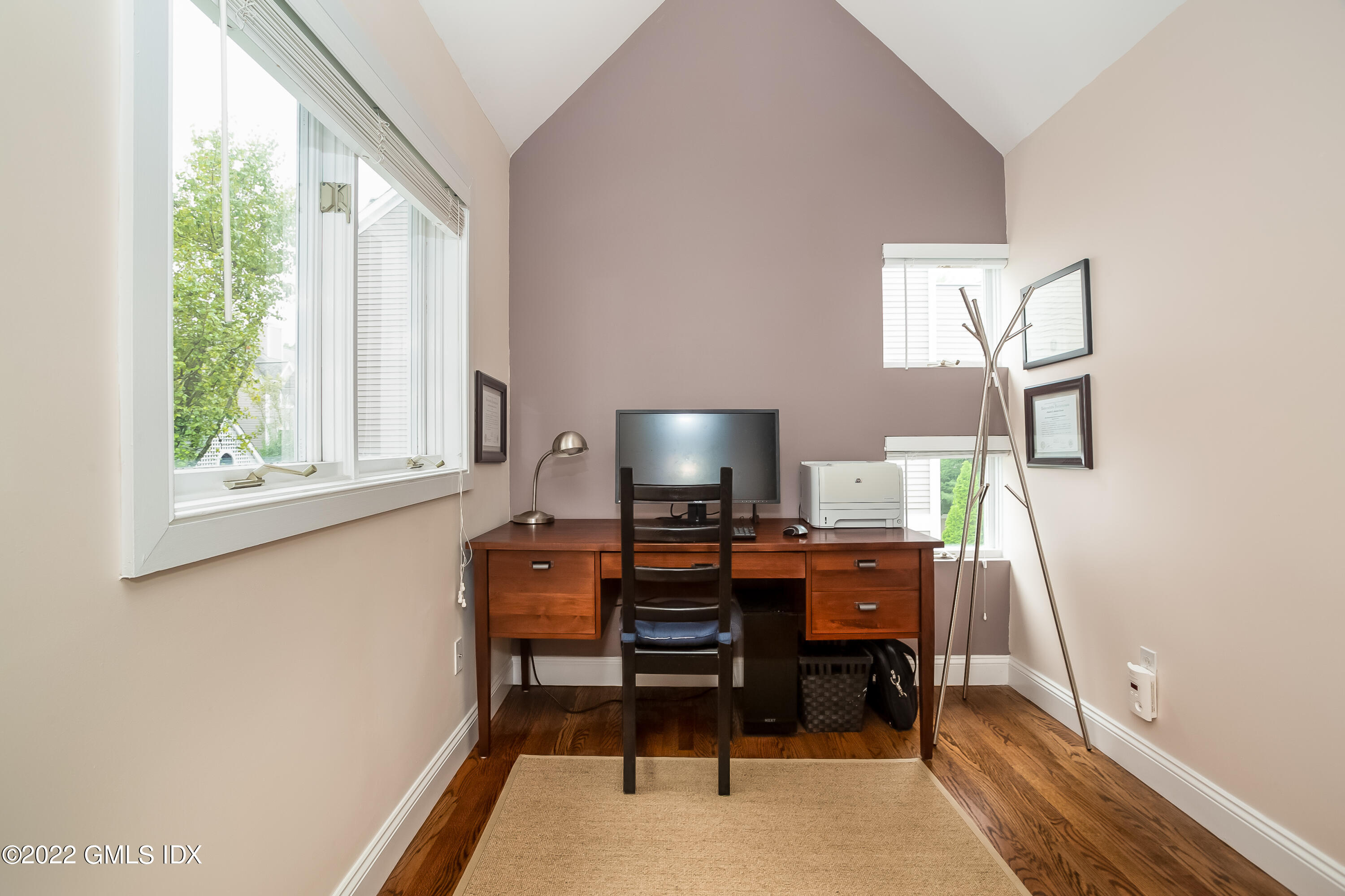 453 East Putnam Avenue, Unit 4H Cos Cob, CT 06807 - Photo 14 of 31 a view of a workspace with furniture and a window