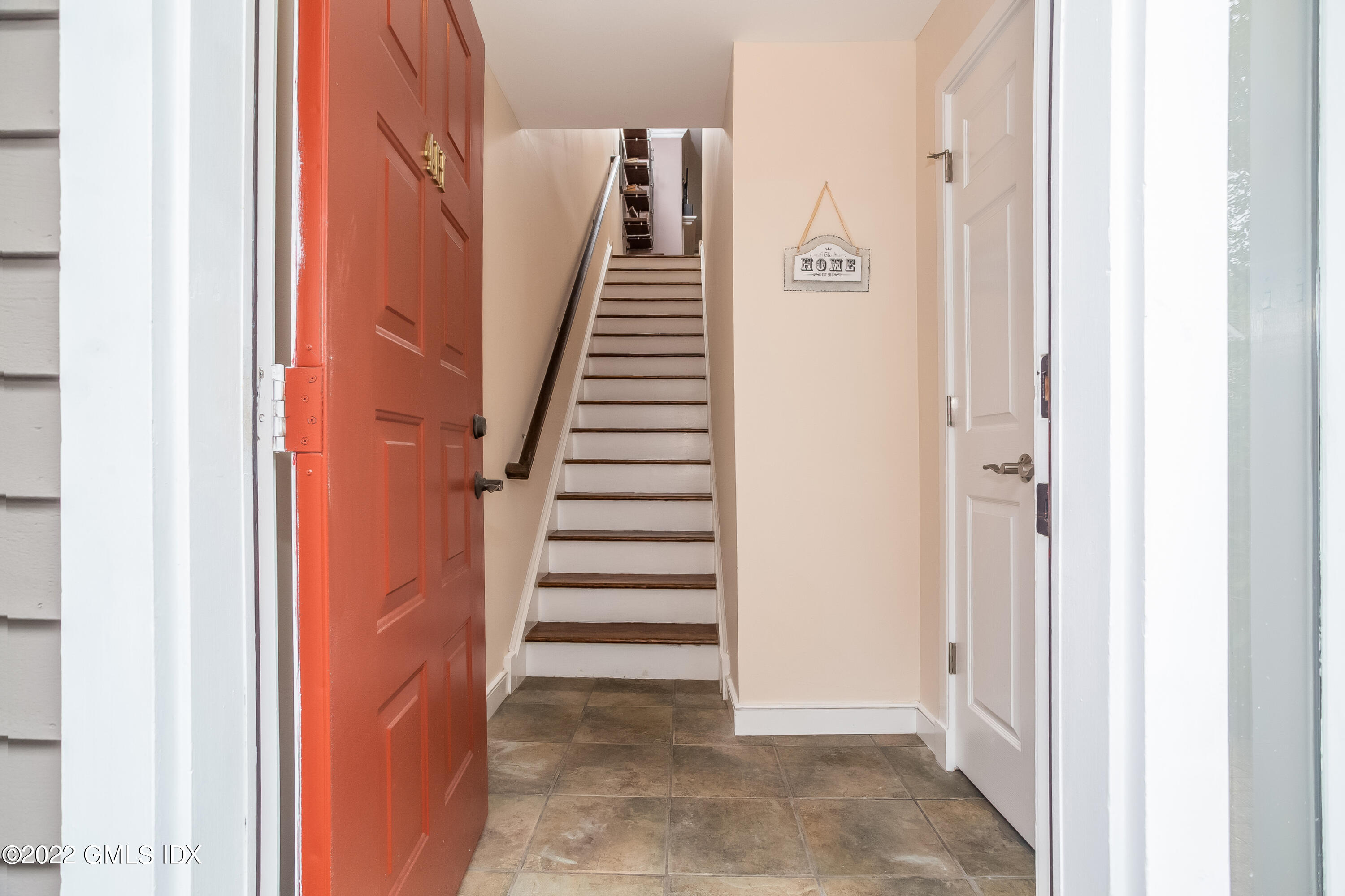 453 East Putnam Avenue, Unit 4H Cos Cob, CT 06807 - Photo 2 of 31 a view of an entryway with staircase