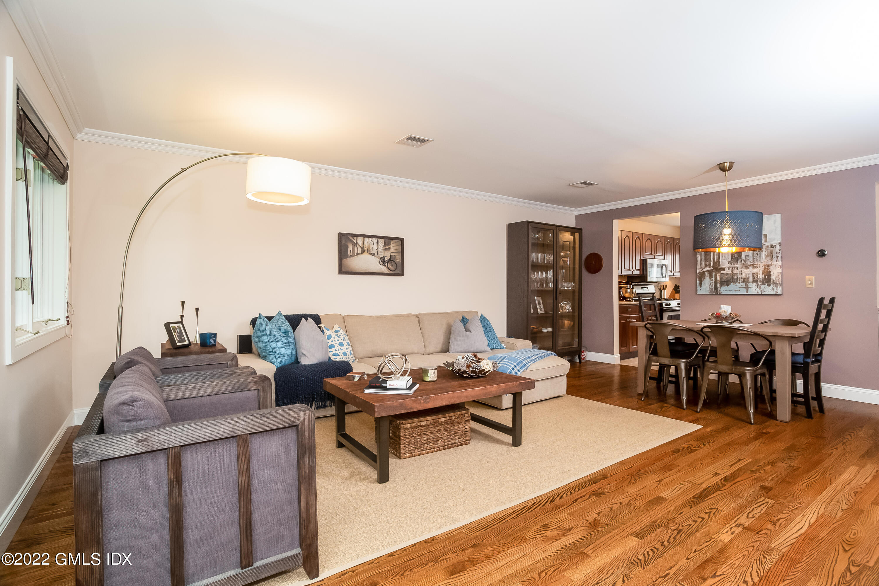 453 East Putnam Avenue, Unit 4H Cos Cob, CT 06807 - Photo 3 of 31 a living room with furniture