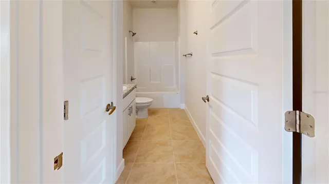 a view of a bathroom with shower
