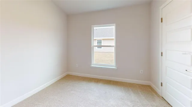 an empty room with a window