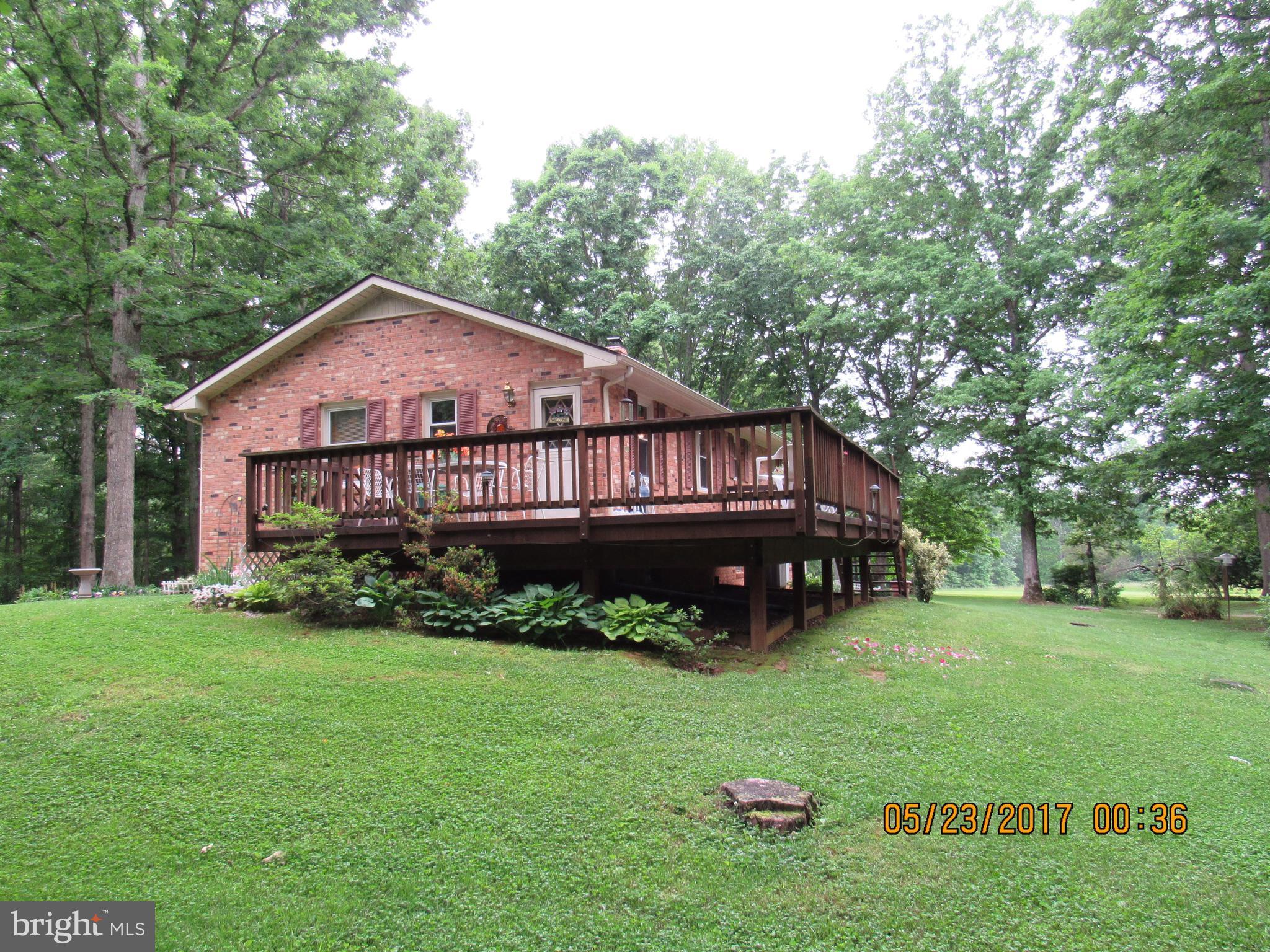 29057 Lacewood Road Rhoadesville, VA 22542 - Photo 17 of 22 home has large back deck, perfect for entertaining