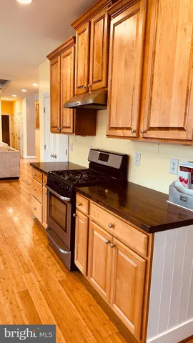 a view of a storage & utility room with a sink