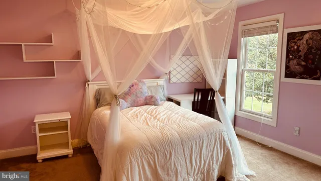 a bathroom with a bathtub and a sink