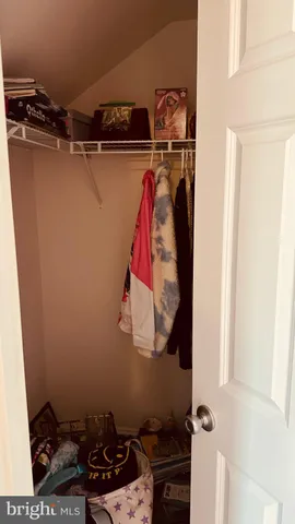 a view of living room and kitchen with furniture