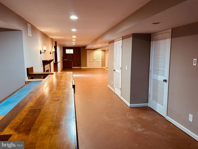 a view of a terrace with wooden fence
