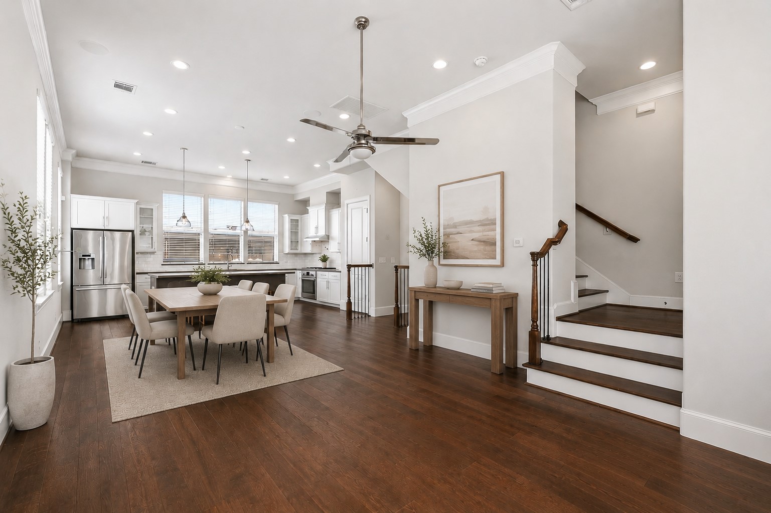9614 Riddlewood Lane Houston, TX 77025 - Photo 7 of 23 a view of a dining room with furniture and wooden floor