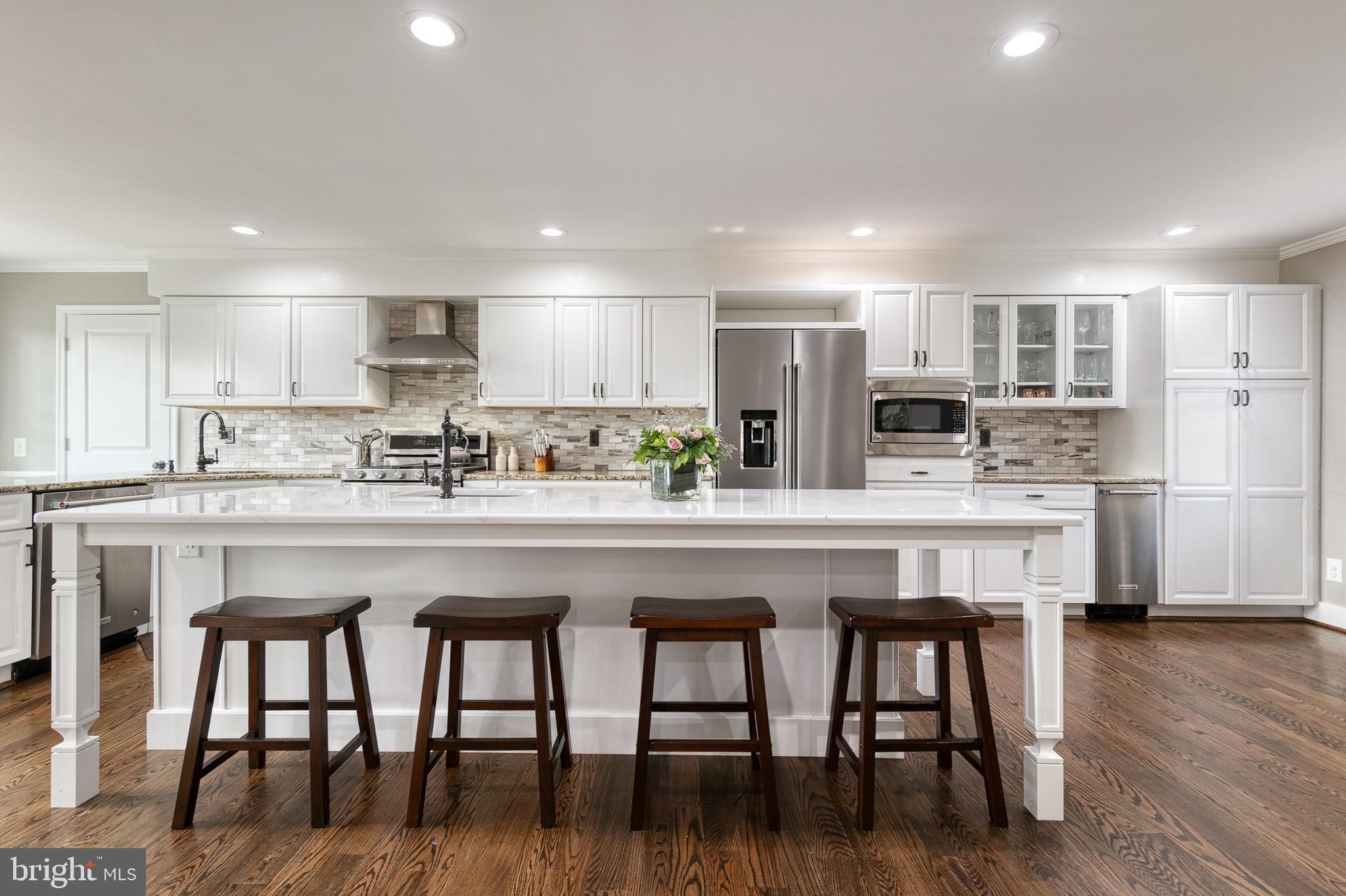709 Chapel Ridge Road Lutherville-Timonium, MD 21093 - Photo 8 of 44 Impressive center island with prep sink & seating