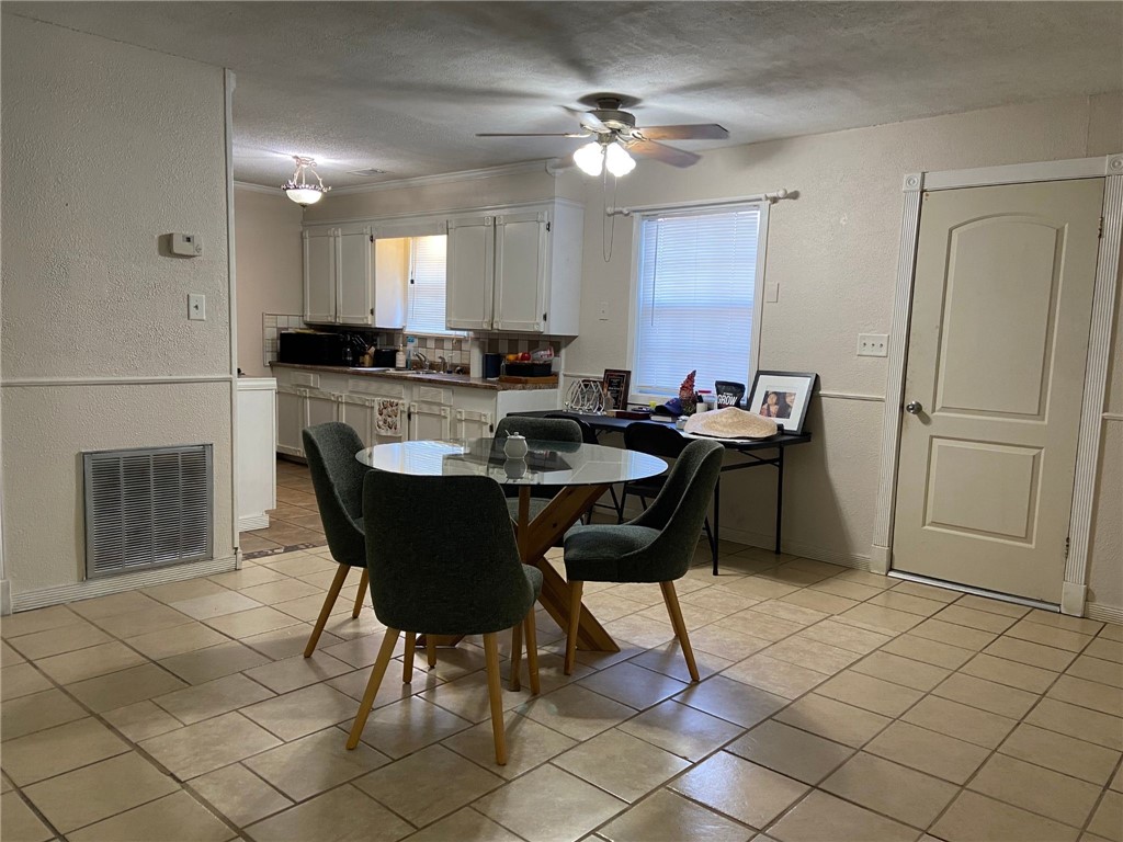 2102 Suarez Street Alice, TX 78332 - Photo 4 of 11 a view of a dining room with furniture