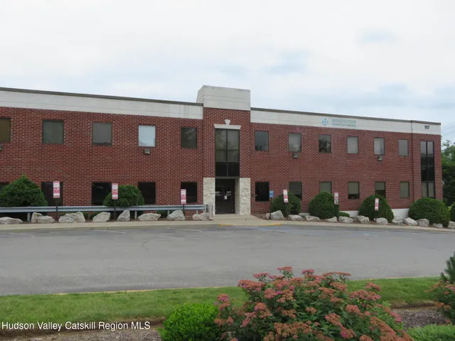 front view of building with a street
