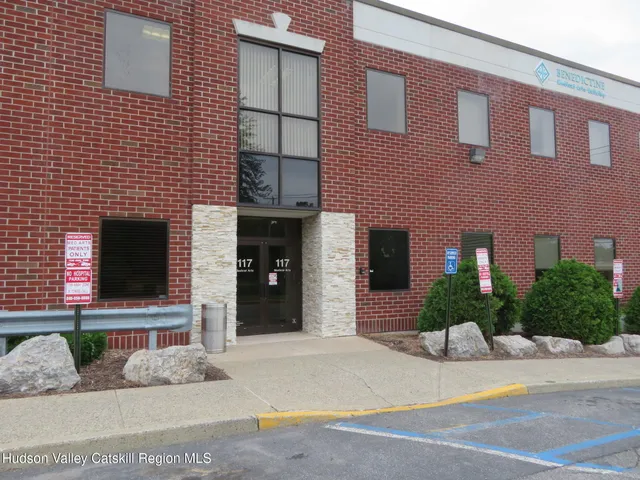 a front view of a house with yard