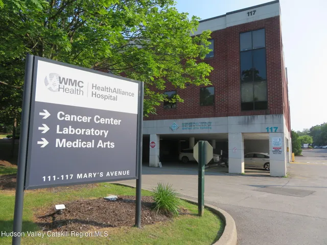 a sign on the side of building