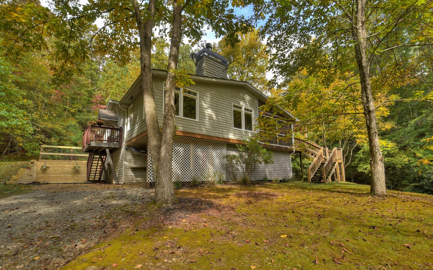 a view of a house with a tree