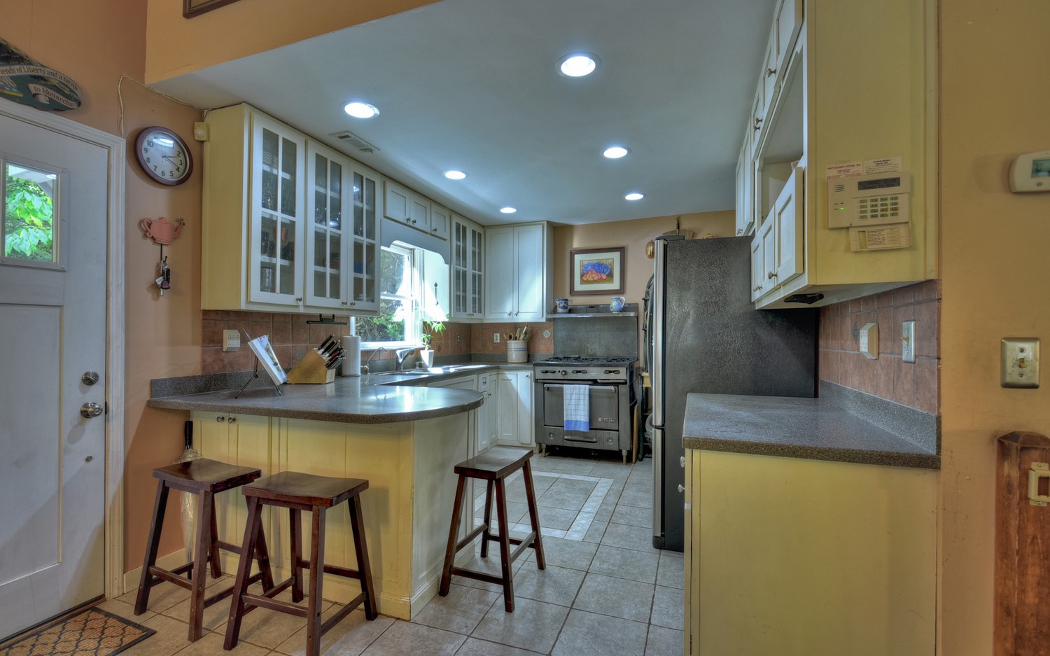 63 Chimney Court Ellijay, GA 30540 - Photo 13 of 49 a kitchen with stainless steel appliances granite countertop a sink and a refrigerator