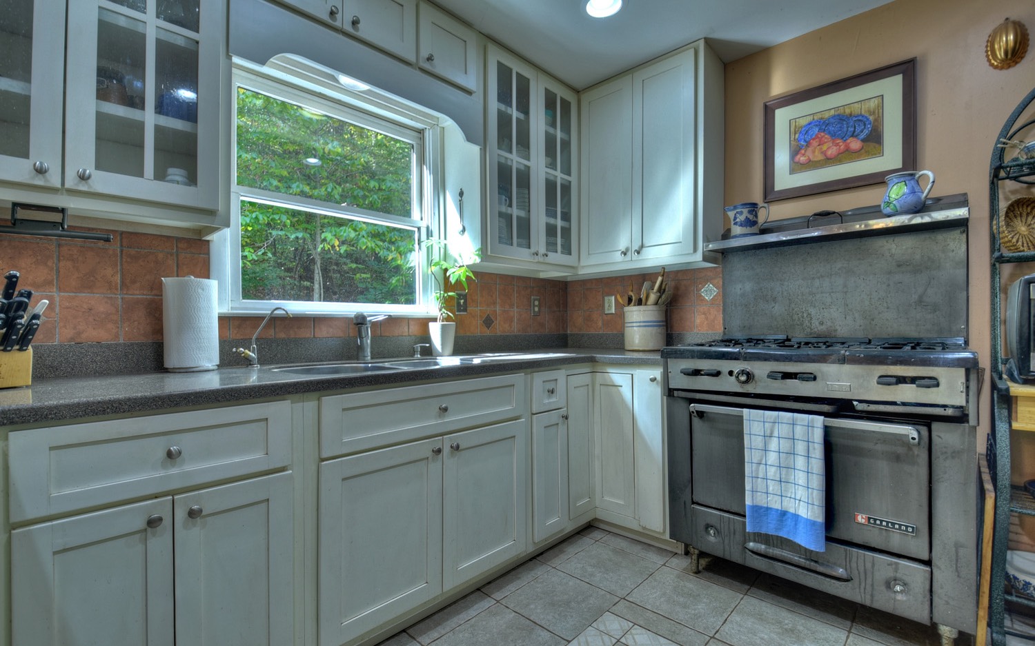 63 Chimney Court Ellijay, GA 30540 - Photo 15 of 49 a kitchen with stainless steel appliances granite countertop a stove and a sink