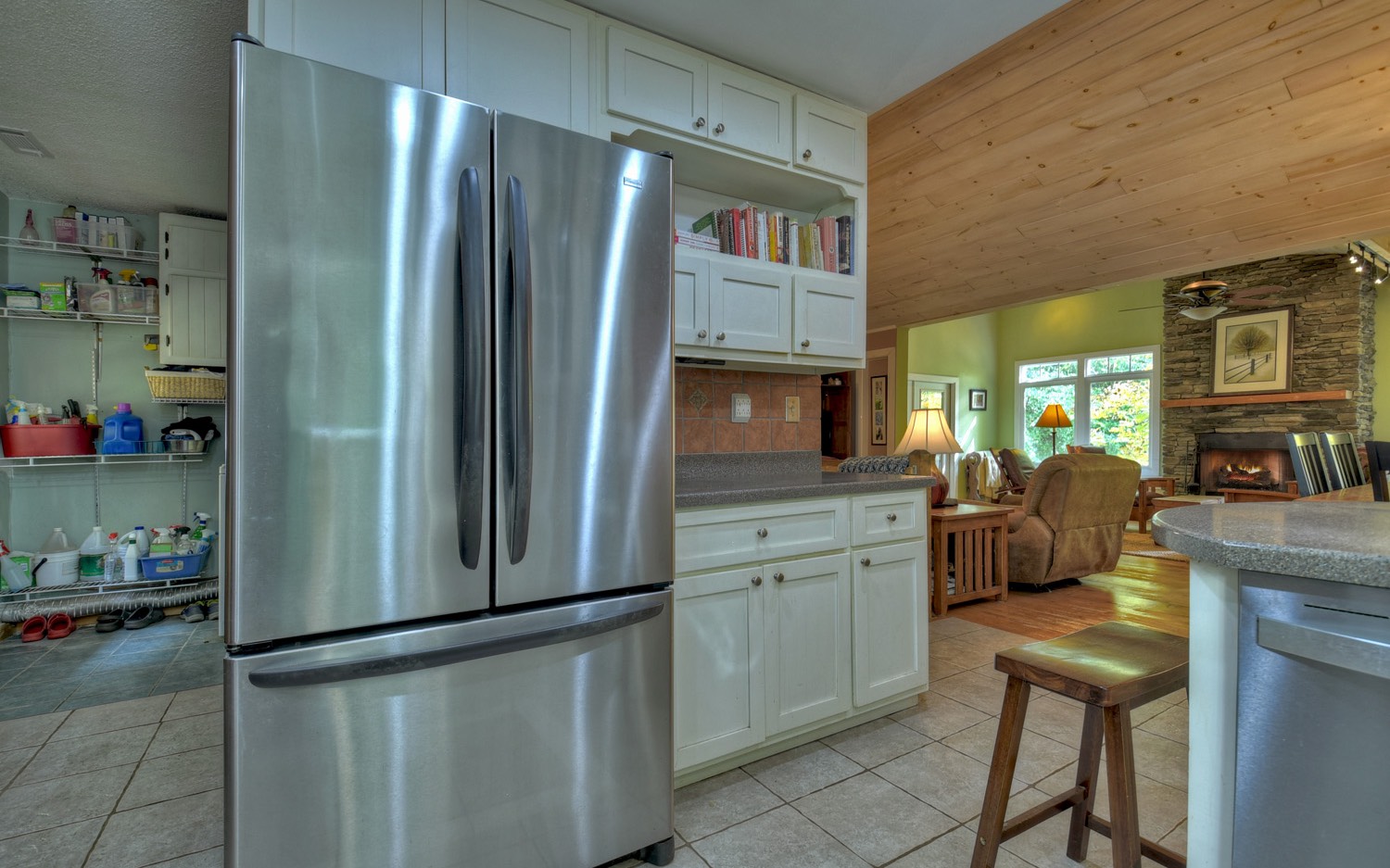 63 Chimney Court Ellijay, GA 30540 - Photo 17 of 49 a kitchen with stainless steel appliances a refrigerator stove and sink