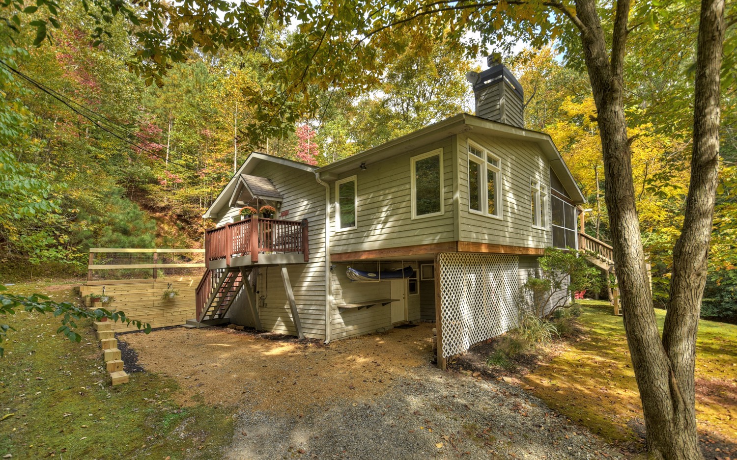 63 Chimney Court Ellijay, GA 30540 - Photo 2 of 49 a front view of a house with a yard