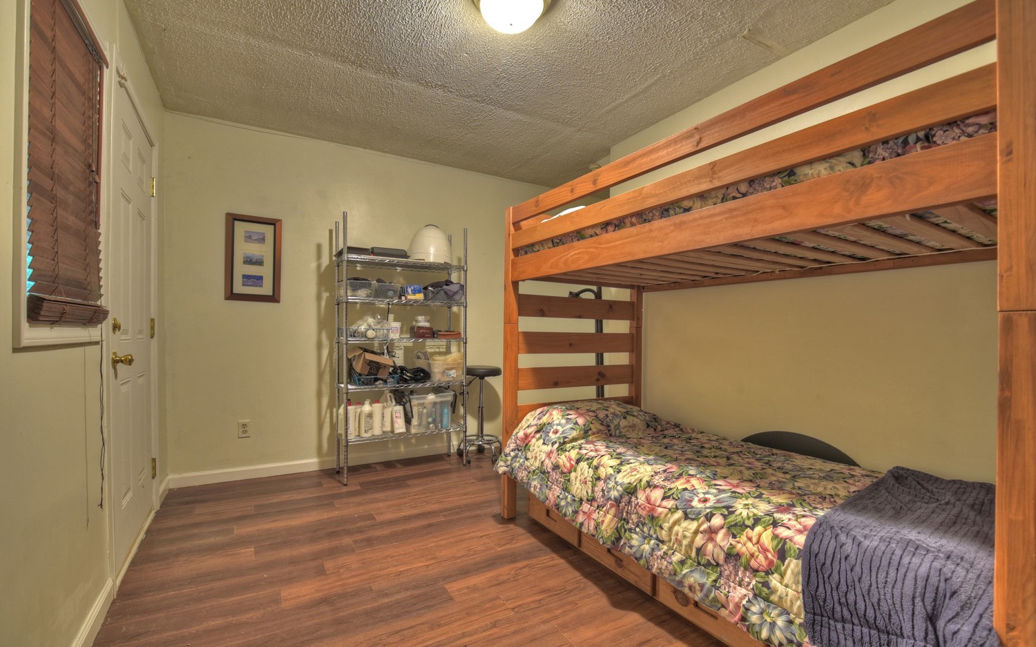 63 Chimney Court Ellijay, GA 30540 - Photo 22 of 49 a bed sitting in a bedroom next to a window