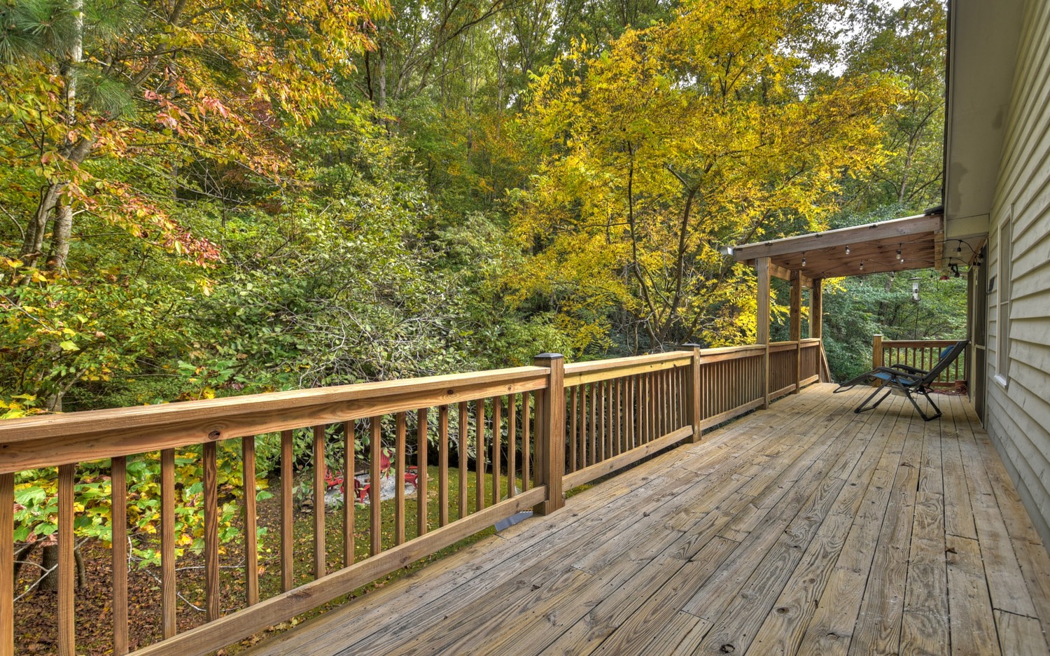 63 Chimney Court Ellijay, GA 30540 - Photo 27 of 49 a view of balcony with wooden floor and fence