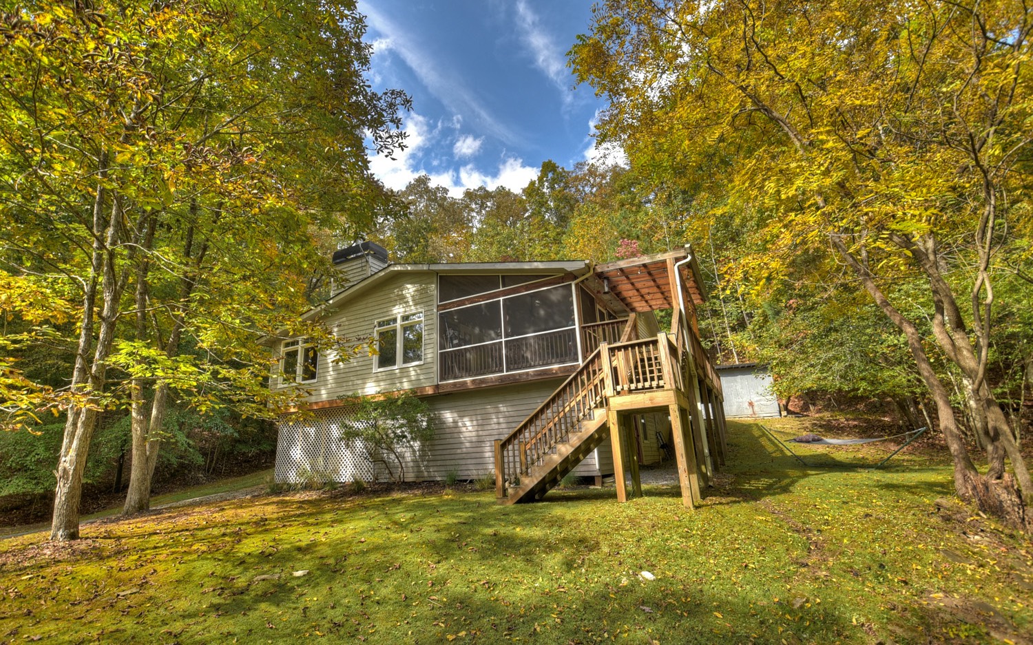 63 Chimney Court Ellijay, GA 30540 - Photo 3 of 49 a view of a house with a yard