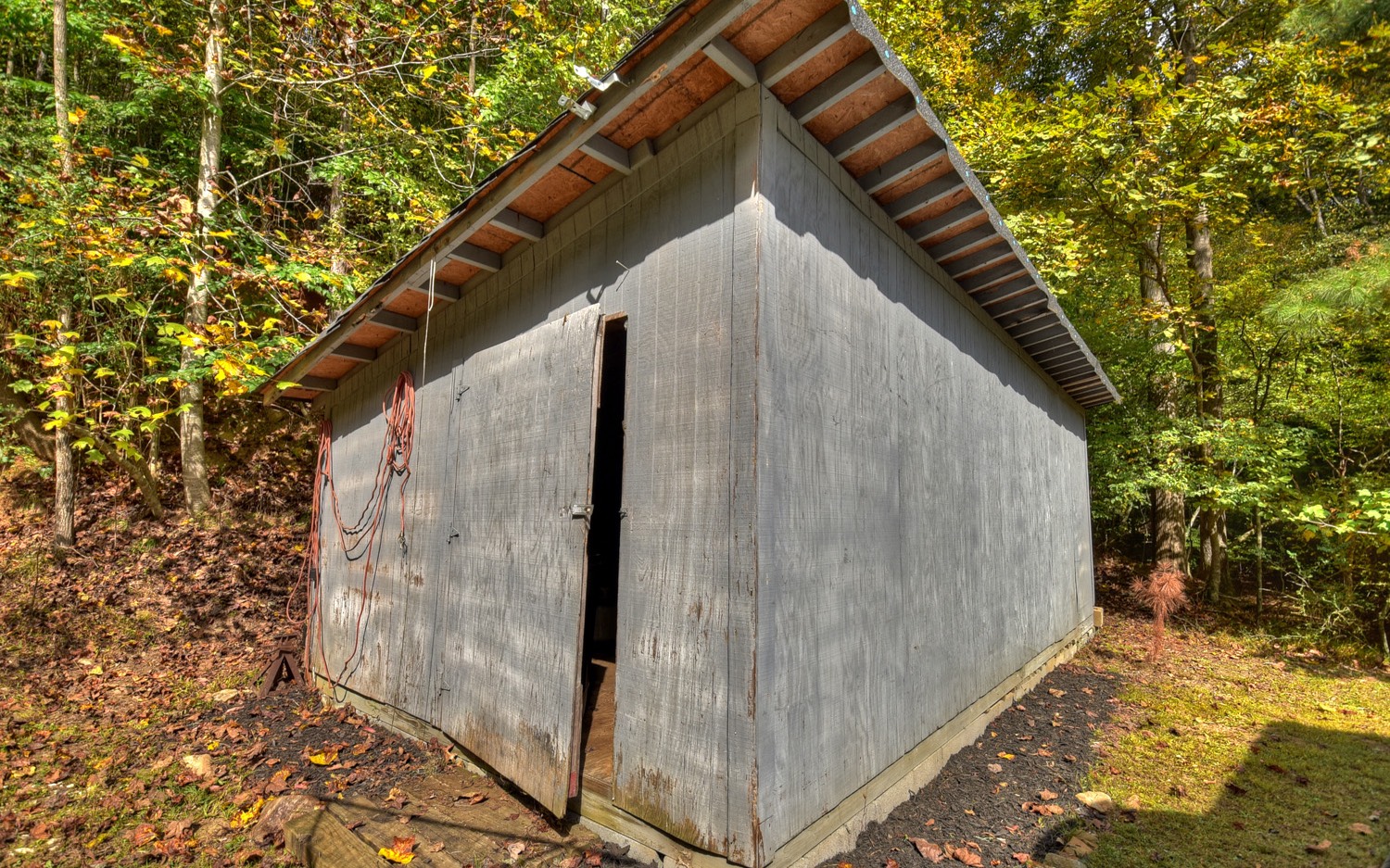 63 Chimney Court Ellijay, GA 30540 - Photo 38 of 49 a backyard of a house with lots of green space